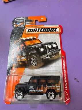 Matchbox Land Rover Defender 110 Toy Car - Black & Orange